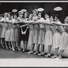 Dyan Cannon [center] and ensemble in the stage production How to Succeed in Business Without Really Trying