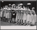 Dyan Cannon [center] and ensemble in the stage production How to Succeed in Business Without Really Trying