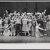 William Major [center] and ensemble in the stage production How to Succeed in Business Without Really Trying