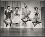 Dancers in the stage production How to Succeed in Business Without Really Trying