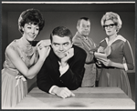 Ronnie Welsh [center] and unidentified others in the stage production How to Succeed in Business Without Really Trying