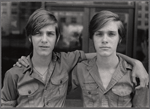 Twins with "Boy Scouts of America" on shirt