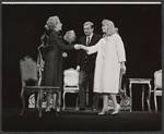 Diane Cilento [at right in white coat] and unidentified others in the stage production The Good Soup