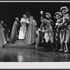 Alec McCowen [center] and ensemble in the stage production Hadrian VII