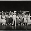 Tony Tanner (center) and company in the stage production Half a Sixpence