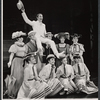 Tony Tanner (waving hat) and company in the stage production Half a Sixpence