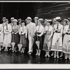 Dick Kallman (center) and company in the stage production Half a Sixpence