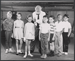 Laurence Naismith, Valerie Lee (3rd from left), and unidentified child performers in rehearsal for the stage production Here's Love