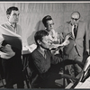 Book writer and composer Hugh Martin (at piano),  Beatrice Lillie, and unidentified men in rehearsal for the stage production High Spirits