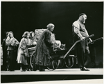 Zero Mostel in the stage production of Fiddler on the Roof as Tevye (pulling cart with family behind him)