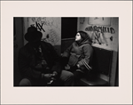 Man in Black Hat, Young Woman in Duffel Coat - Sitting in Corner Seat