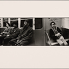 Black Man in Overcoat Looks at Camera, Two Passengers beside him Dream Away: Alarmed Young Hispanic Man in Black Jacket in Corner Seat Looks at Camera
