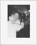 Series # 9 [Two men, one tying boxing glove with teeth]