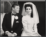 Gordon MacRea and Carol Lawrence in the stage production I Do! I Do!