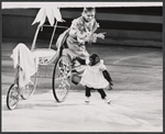 Skater and trained animal [monkey] in the Icestravaganza of the 1964 New York World's Fair