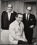 Alan King [center] and unidentified others in publicity pose for the stage production The Impossible Years