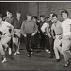 Arik Lavie [center] and ensemble in rehearsal for the stage production Irma La Douce