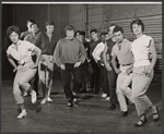 Arik Lavie [center] and ensemble in rehearsal for the stage production Irma La Douce