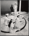 Clockwise from bottom: Elaine Petricoff, Jack Blackton, Dan Goggin, Danny Guerrero, Marvin Solley, and Sharron Miller in the stage production Hark!