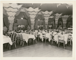 Dining area of the nightclub Billy Rose's Diamond Horseshoe with part of dance floor visible in foreground