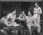 Bill Travers [center left with hands out] and unidentified others in the stage production A Cook for Mr. General