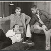 Director Robert Rossen [standing], Gene Boland [standing with foot on mattress] and unidentified [laying on mattress] in rehearsal for the stage production The Cool World