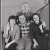 Portrait of playwright William Inge (standing), Eileen Heckart, Pat Hingle, and Teresa Wright during rehearsal for the stage production The Dark at the Top of the Stairs