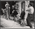 Angela Lansbury, Kurt Peterson (seated), and ensemble in the stage production Dear World
