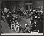 Cast and production team in rehearsal for the stage production The Deputy