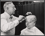 Emlyn Williams in makeup during rehearsal for the stage production The Deputy