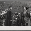 Jeremy Brett [left foreground], unidentified [right foreground] and ensemble in the stage production The Deputy