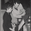 Unidentified woman and director-choreographer Michael Kidd in rehearsal for the stage production Destry Rides Again