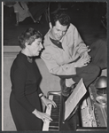 Unidentified woman and director-choreographer Michael Kidd in rehearsal for the stage production Destry Rides Again