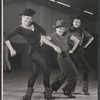 Director-choreographer Michael Kidd (center) with two unidentified dancers in rehearsal for the stage production Destry Rides Again