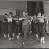 Director-choreographer Michael Kidd (front and center) leads the company in rehearsal for the stage production Destry Rides Again