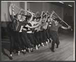 Director-choreographer Michael Kidd (far right) and dancers in rehearsal for the stage production Destry Rides Again