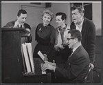 Book writer Leonard Gershe, Dolores Gray, director-choreographer Michael Kidd, Andy Griffith, and composer Harold Rome at the piano during rehearsal for the stage production Destry Rides Again