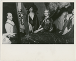 Showgirls and stagehands backstage during a Billy Rose stage production