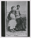 Portrait of Sea Island School teacher Miss Harriet W. Murray, with students Elsie and Puss
