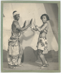 Dancer and choreographer Asadata Dafora with Musu Esami (Frances Atkins), as the bridegroom and bride, in his dance-musical production "Kykunkor" 