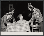 Keith Charles and Anne Baxter (seated), and unidentified actors in the stage production Applause