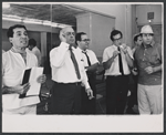 Choreographer Peter Gennaro, unidentified man, writer Ernest Kinoy, composer Walter Marks, and Herschel Bernardi during rehearsal for the stage production Bajour