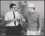 Composer Walter Marks, unidentified man, and Herschel Bernardi during rehearsal for the stage production Bajour