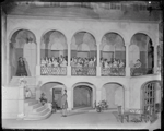 Scene from the opera Deep River with chorus on balcony