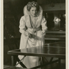 Helen Menken (as Queen Elizabeth) plays ping pong backstage during production of Mary of Scotland