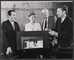 Walter Fried [far left], Helen Jacobson [second from left], Henry Butler [far right] and unidentified in rehearsal with set design model for the Broadway production of Abraham Cochrane