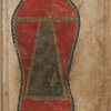 A black trapezoid representing the Kaʻbah within a large red footprint