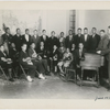 Dean Dixon, seated fifth from left, in a group portrait with the symphony orchestra that he organized, at the Harlem Y.M.C.A., New York City