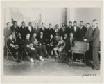 Dean Dixon, seated fifth from left, in a group portrait with the symphony orchestra that he organized, at the Harlem Y.M.C.A., New York City