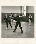George Balanchine rehearsing Violette Verdy in studio while three other female dancers look on
